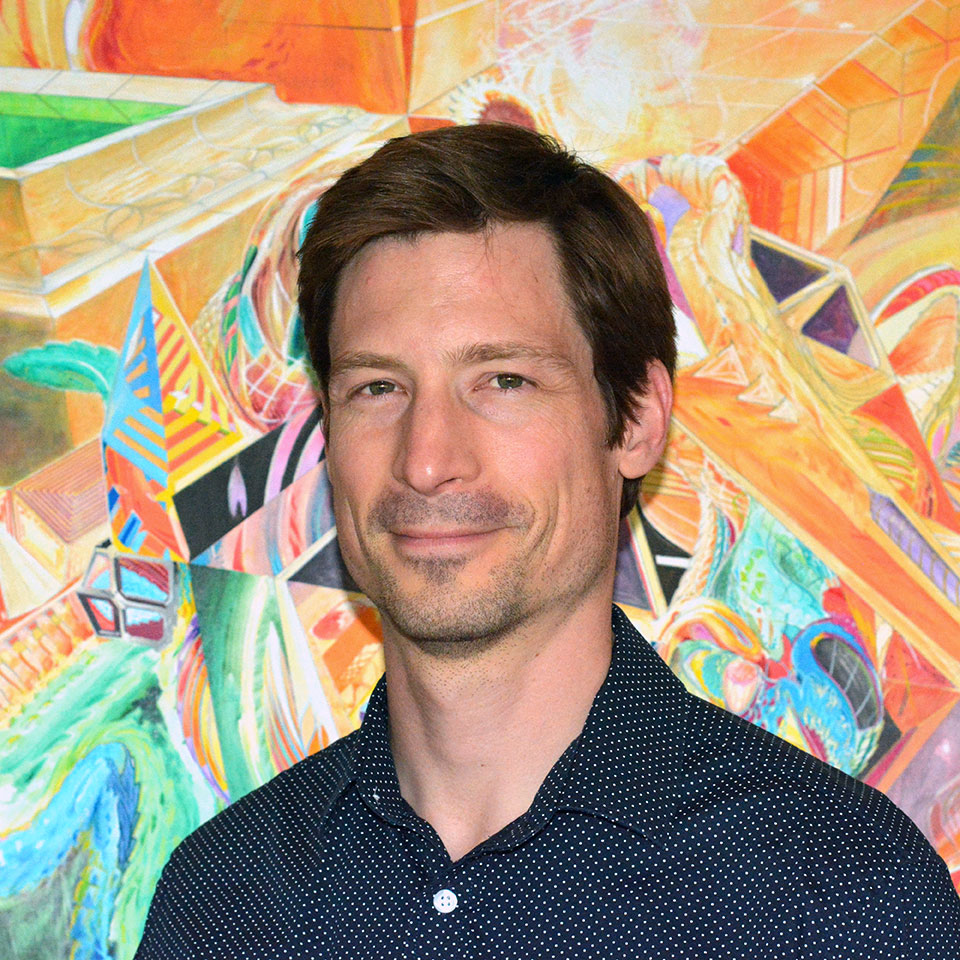 Zach Kirshner in front of his abstract painting